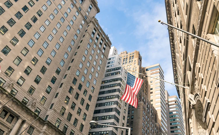 New York skyscrapers and flag